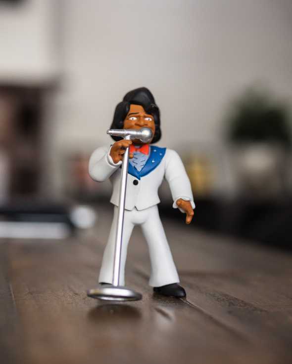 Cartoonish James Brown figurine